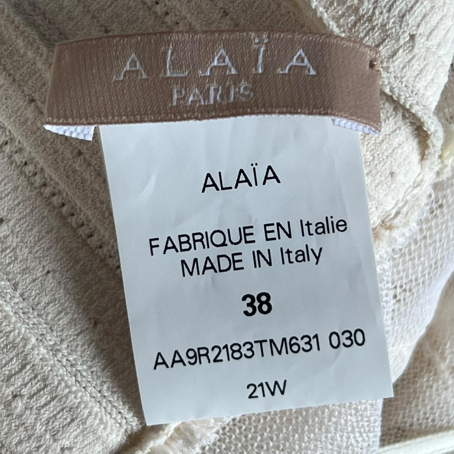 Donna Alaïa A/I 2021 Vestito in maglia con volant avorio in vendita