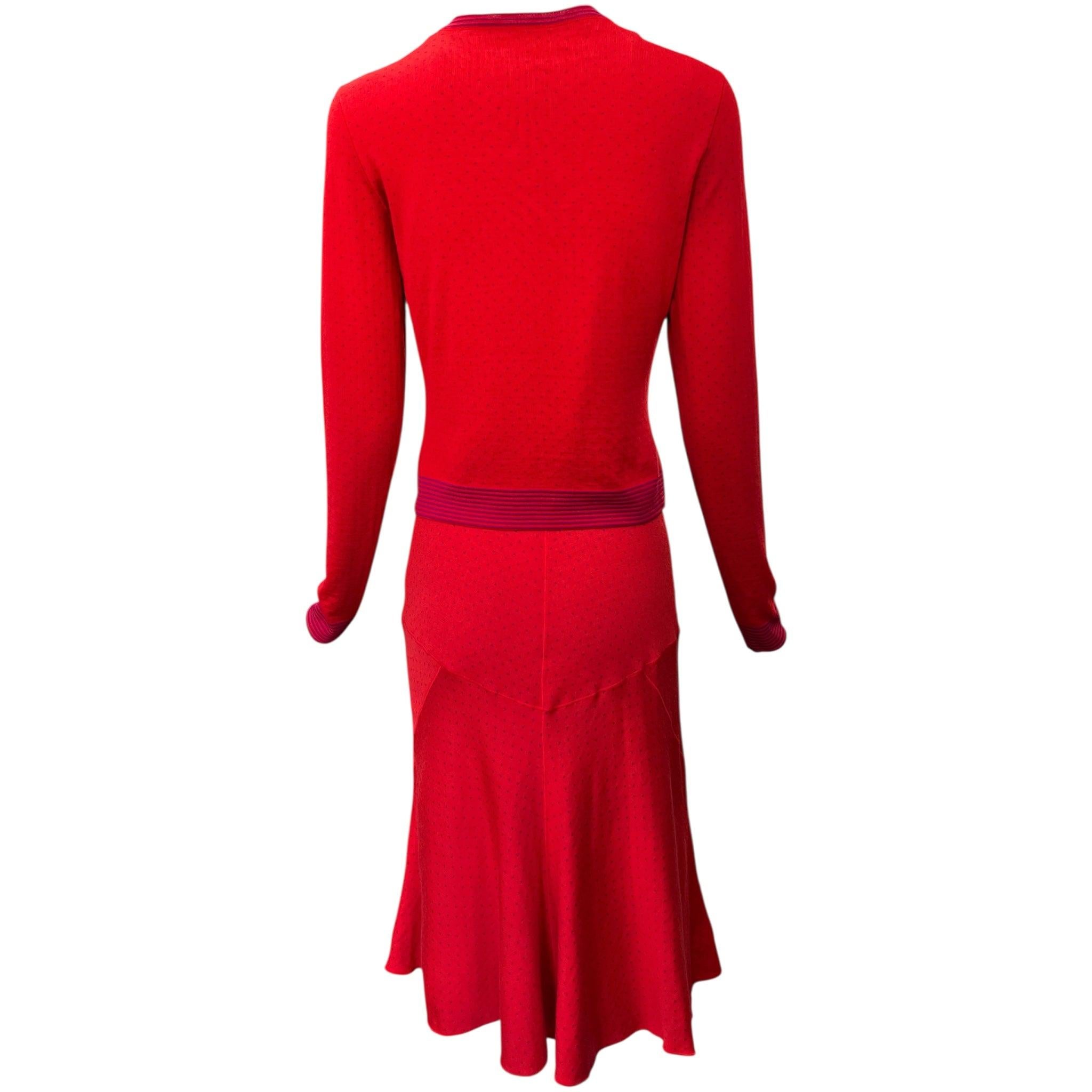 She's the Girl Next Door in an early 2000's Rom-Com and we love her. Alaia Fall/Winter 2001 dress and cardigan sweater set made for a true sweetheart. Red wool and rayon knit with magenta polka dots. Striped magenta accents at sweater cuffs and hems