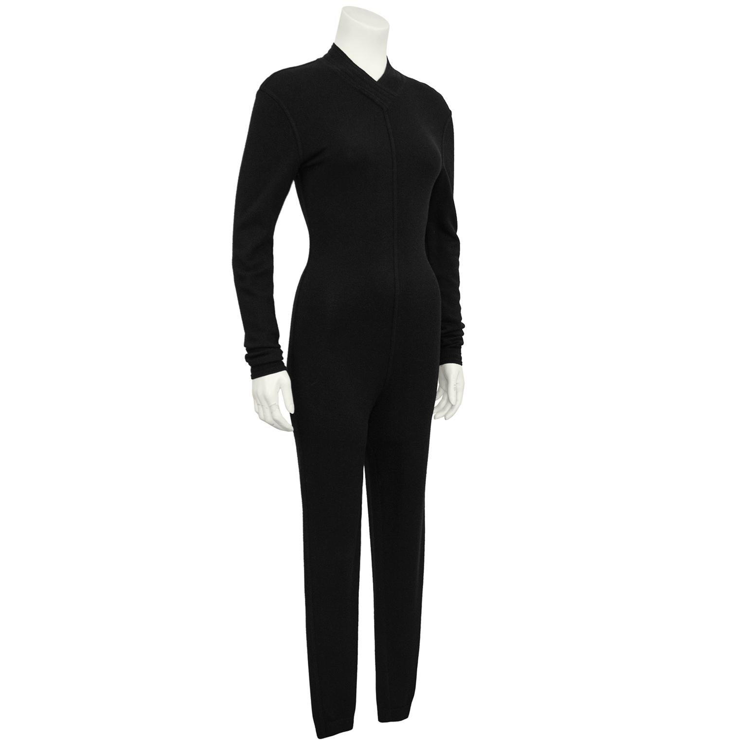 Alaia black knit 1991 Fall one piece cat-suit from perhaps the most celebrated collection Azzedine Alaia ever sent down the runway. His most coveted leopard and butterfly pieces from fall 1991 were memorable and iconic. This plain black version was
