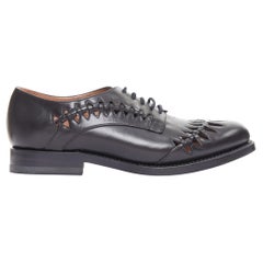 ALAIA Goodyear black leather laser cut out braided brogue EU38