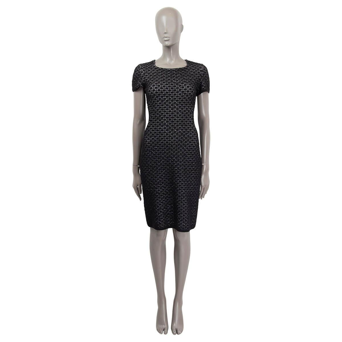 100% authentic Alaïa lattice knit dress in black and grey wool blend (missing tag). Featuring cap sleeves. Closes with invisible zipper on the back. Unlined. Has been worn and is in excellent condition. 

Measurements
Tag Size	S (Missing