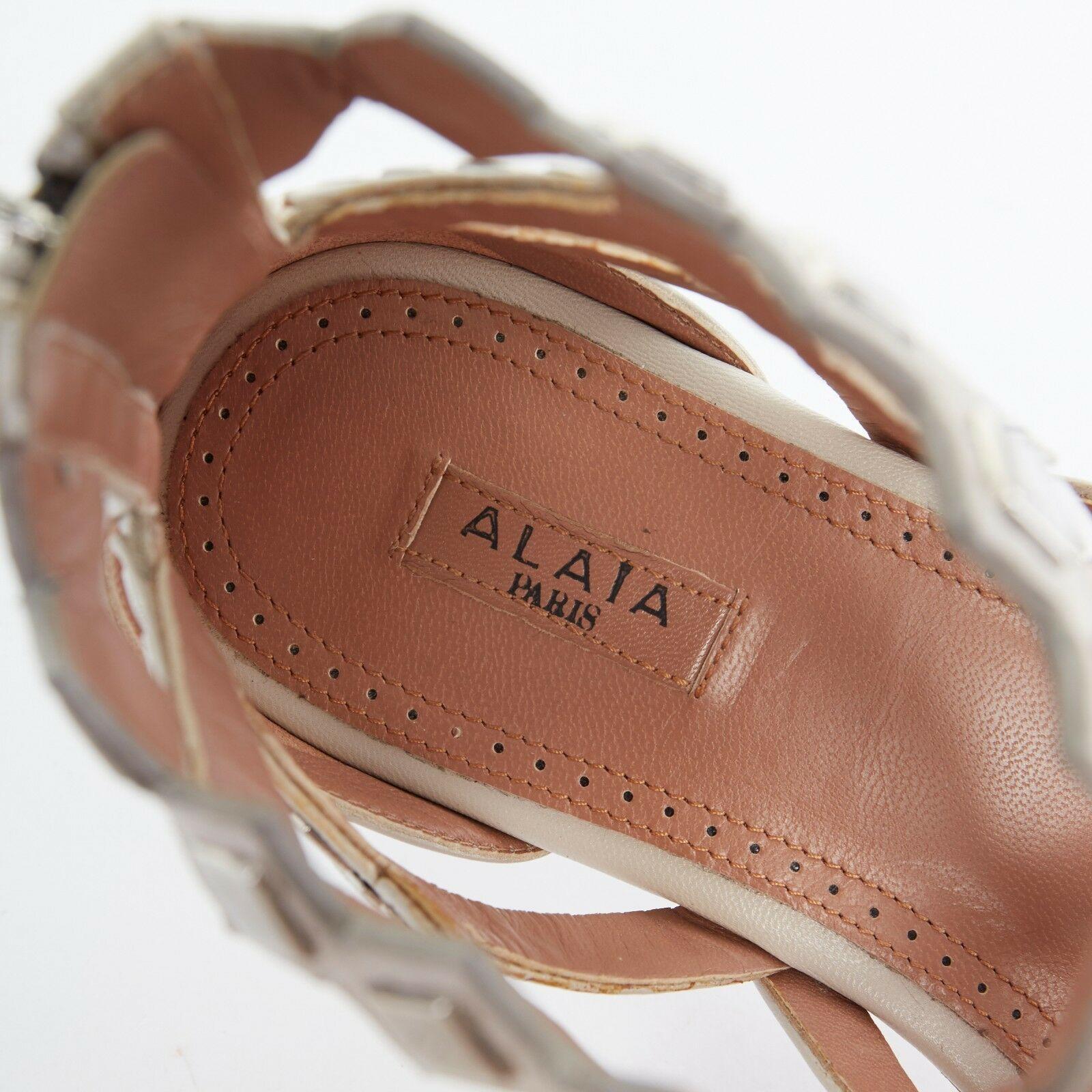 ALAIA grey leather silver square metal applique jagged strap flat sandals EU37 5