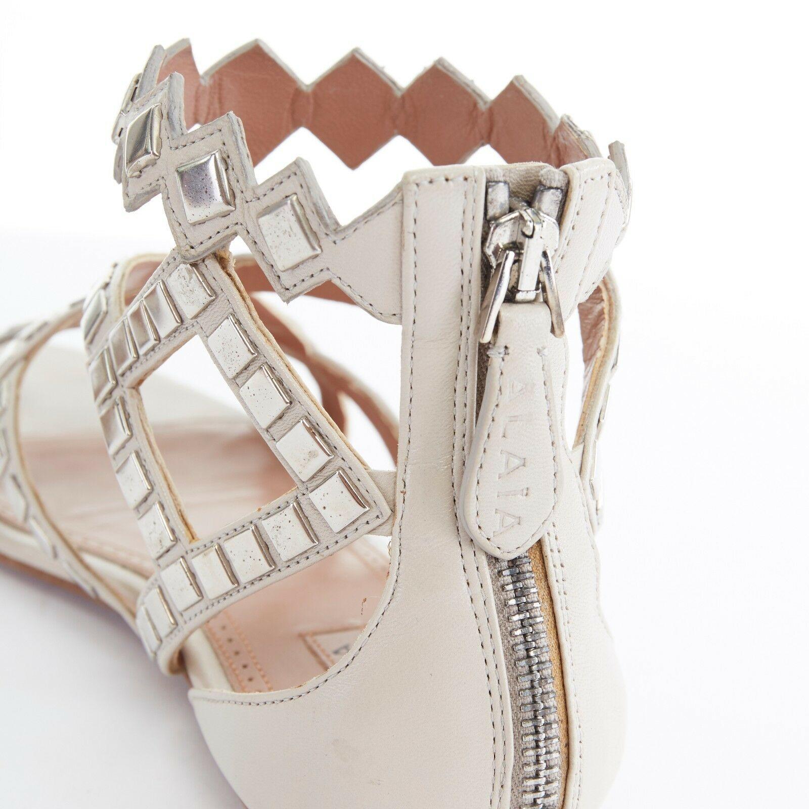 ALAIA grey leather silver square metal applique jagged strap flat sandals EU37 3