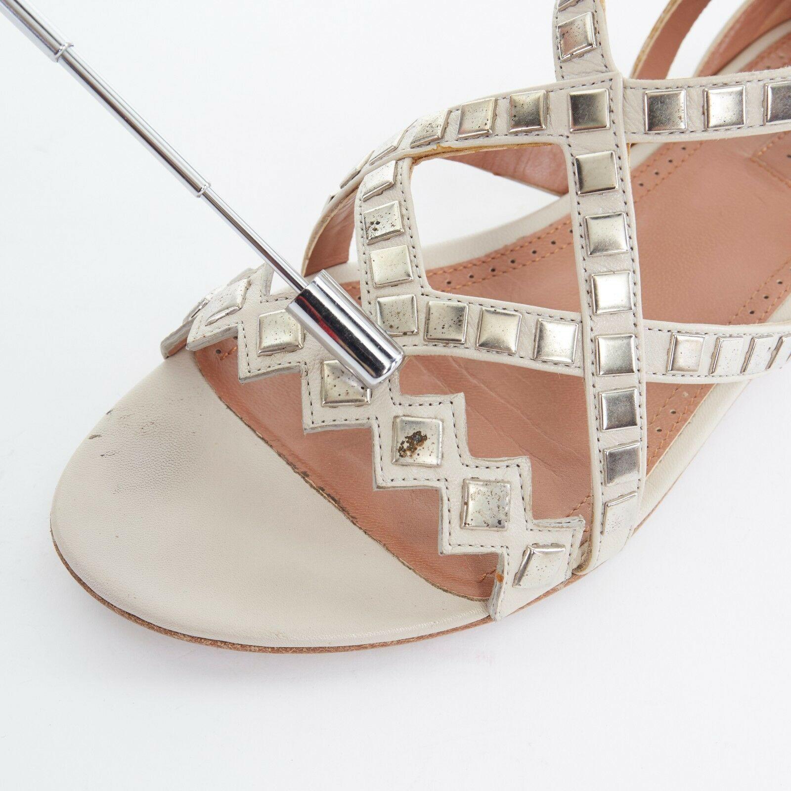 ALAIA grey leather silver square metal applique jagged strap flat sandals EU37 4