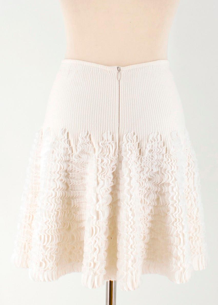 Beige Alaia ivory ruffle-trimmed stretch-knit mini skirt US 6