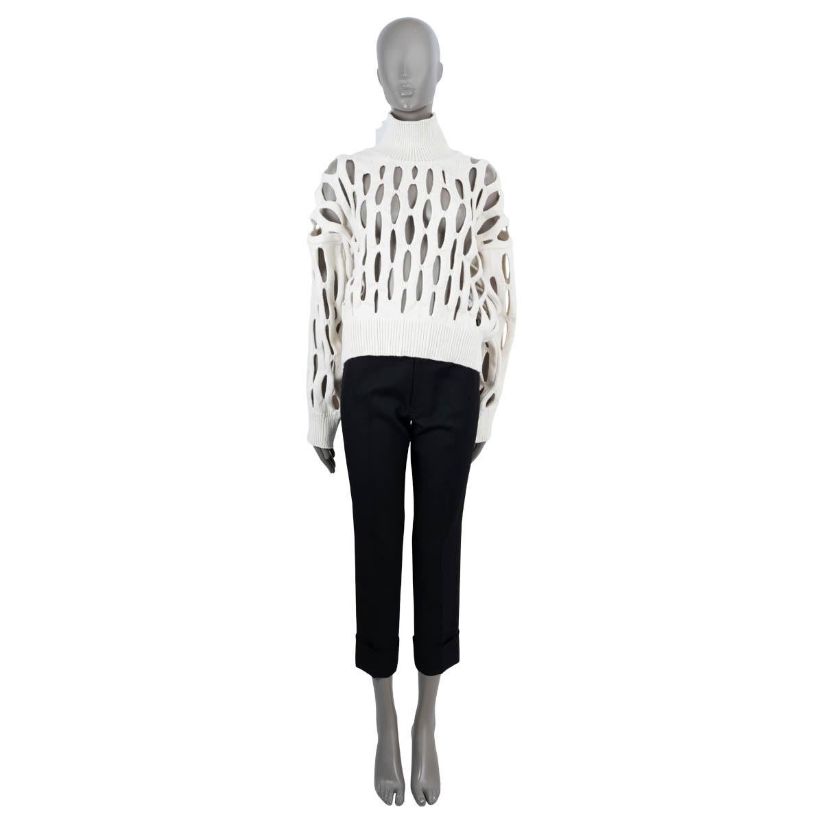 100% authentic Alaïa turtleneck sweater in ivory wool (100%). Features geometric cut-outs, rib-knit neck, hem and cuffs. Unlined. Has been worn and is in excellent condition.

2022 Spring/Summer

Measurements
Model	AA9S01551M682
Tag