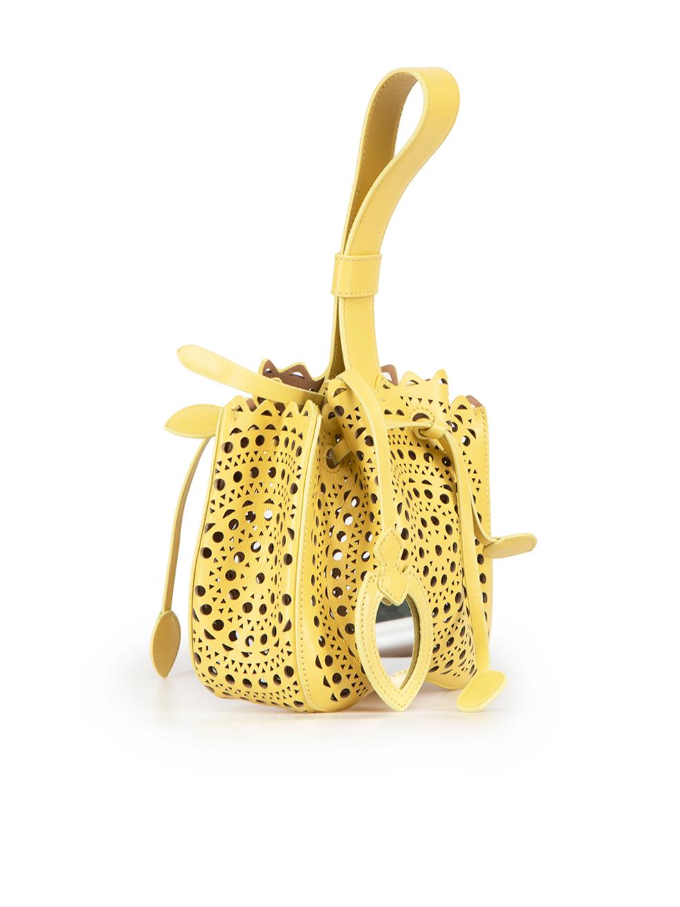 CONDITION is Never worn. No visible wear to bag is evident on this new Alaïa designer resale item. This item comes with original dust bag.

Details
Rose Marie Mini Vienne Clutch
Yellow
Leather
Mini clutch bag
Cut out pattern
1x Top handle
Drawstring