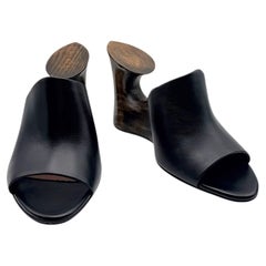 Alaïa La Sculpture Black Leather Architectural Cutout Wood Heel Mules, EU 37