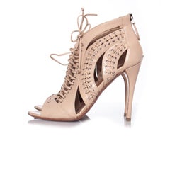 Alaia, Lace up leather cut out sandals