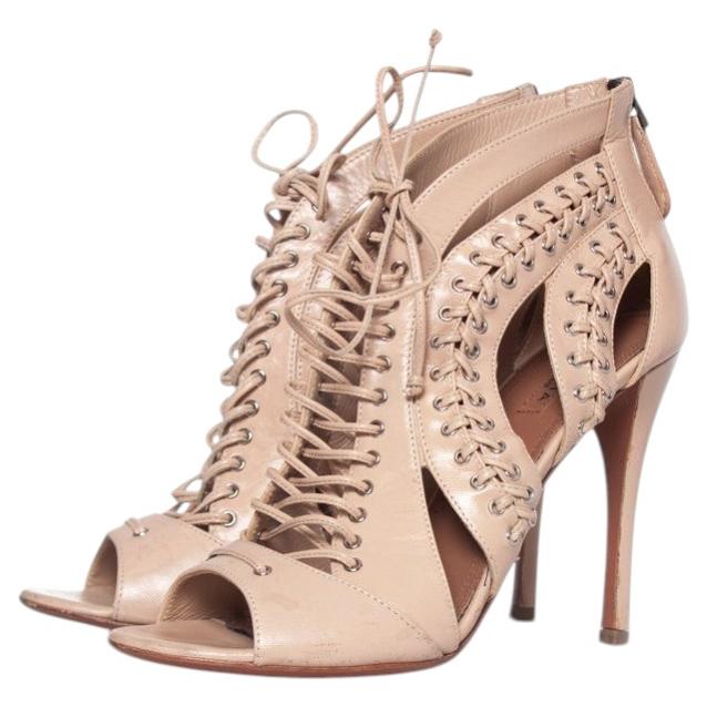 Alaia, Lace up leather cut out sandals