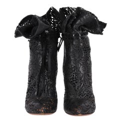 Alaia Laser-Cut & Lace Detail Leather Ankle Boots