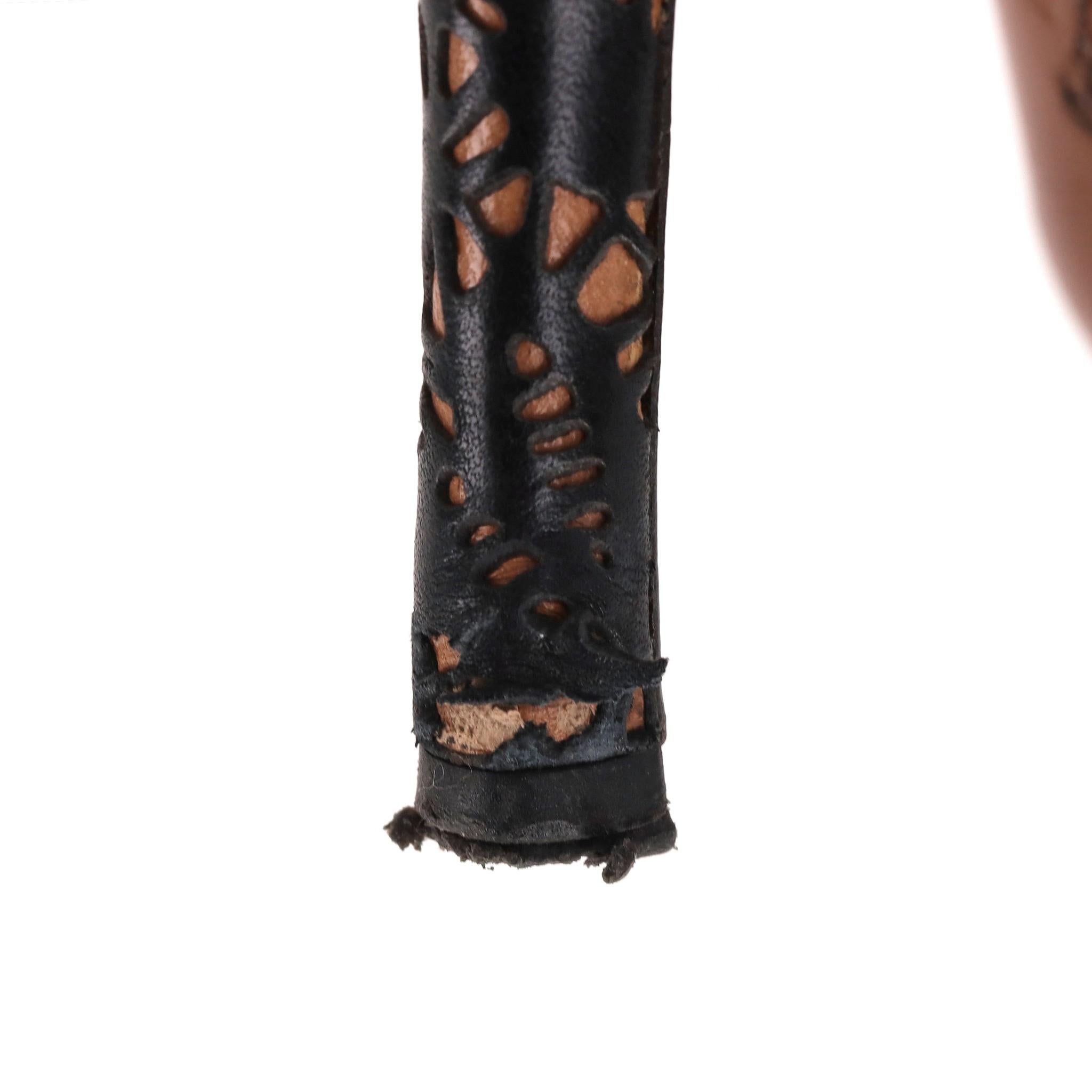 Botines Alaia de piel con corte láser y detalle de cordones en venta 2