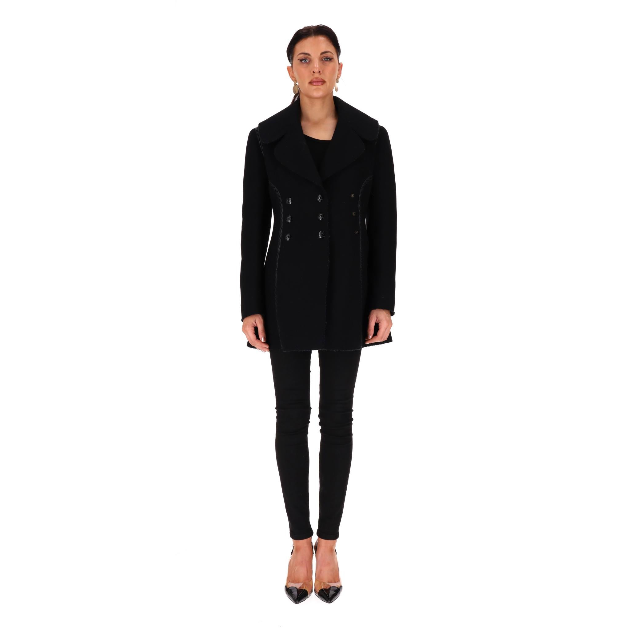 Alaia Leather Trimmed Tailored Wool Coat

Black coat crafted from wool in a fit and flare silhouette adorned with a distinctive braided leather trim details.

Featuring a double-breasted design with 'Alaia' embossed press-stud buttons. 

Rrp