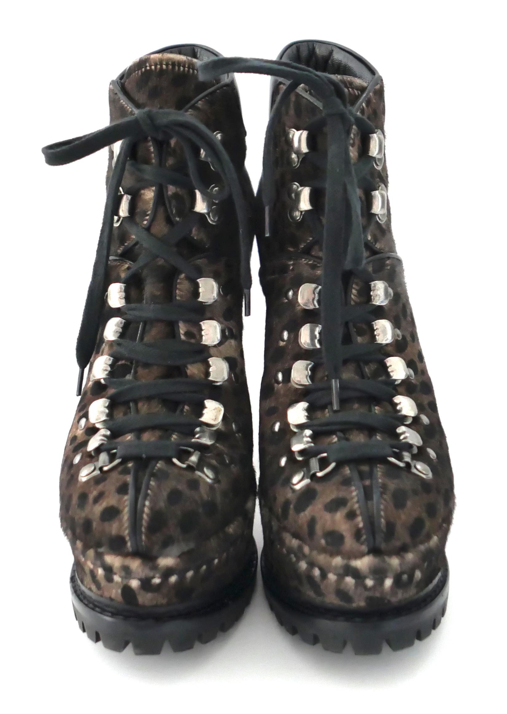 Stunning Alaia platform ankle boots. Bought for €1395, worn once for an indoor magazine shoot and really as new with box and dustbag. Made from leopard print calf skin, they have hiking boot inspired laces, hand stitched inset platforms and chunky