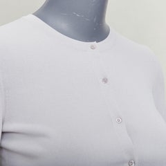 ALAIA - Cardigan court à col ras du cou en viscose lilas avec petits boutons FR36 S
