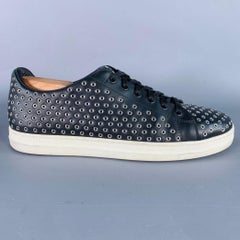Baskets ALAIA Marked IT 41 en cuir noir à œillets argentés, à lacets