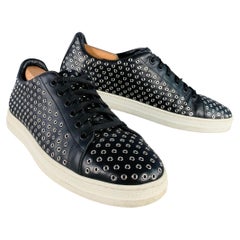 Baskets ALAIA Marked IT 41 en cuir noir à œillets argentés, à lacets