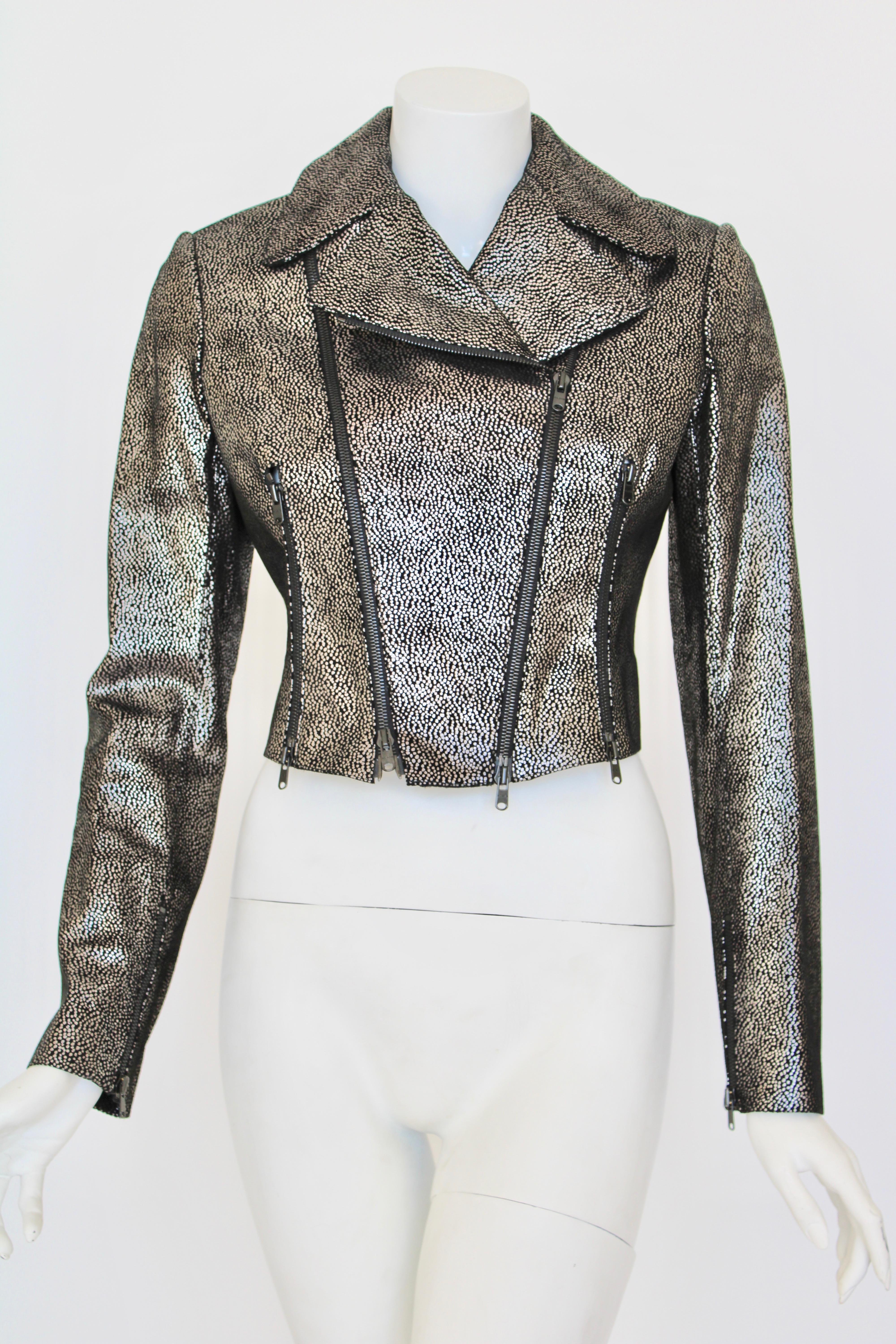 A long sleeve suede motorcycle jacket with hand painted silver dots all over, multiple zippers in the front create a wonderful shape.