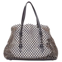 ALAIA Mina black leather silver dome studs net cut out medium tote bag