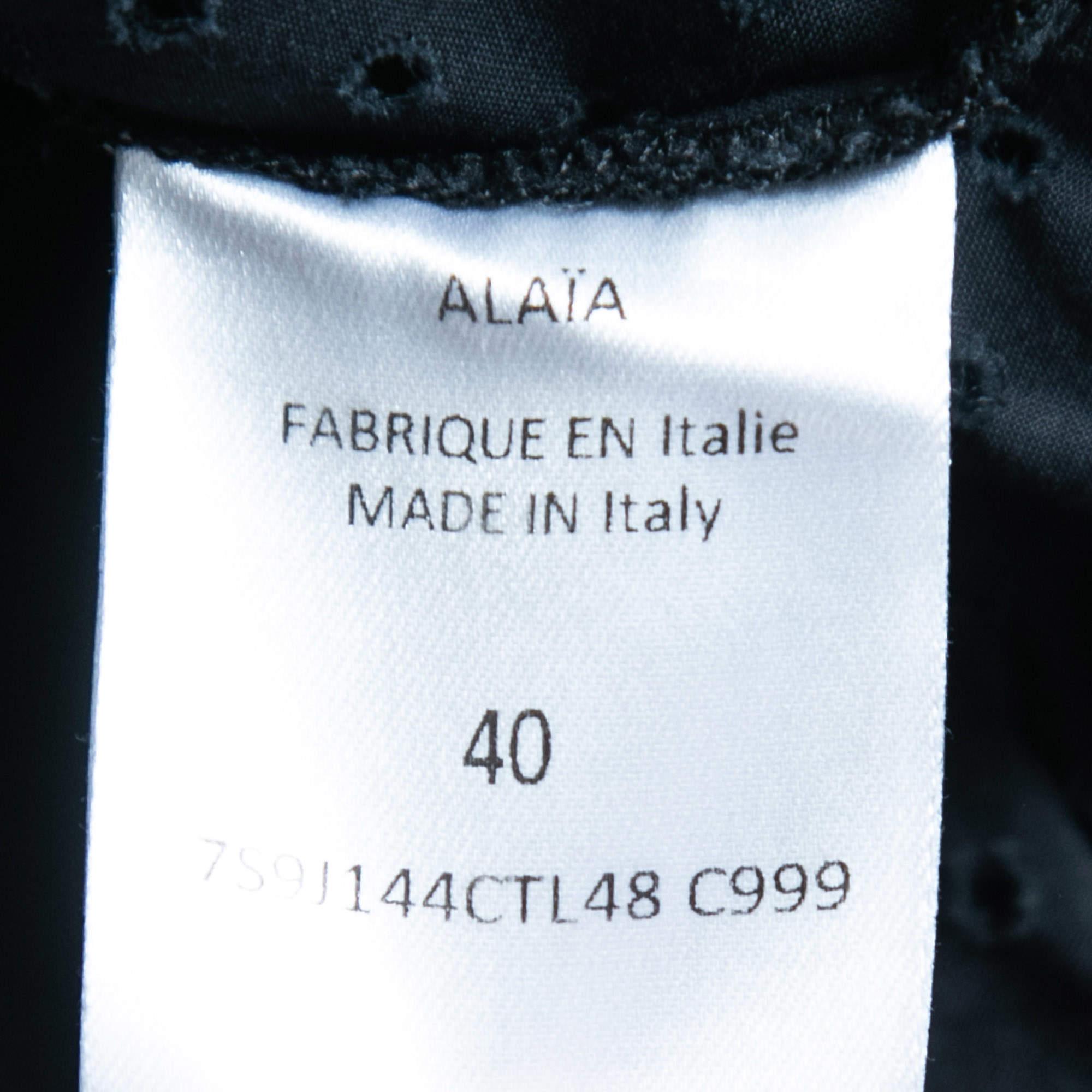 Alaia Marineblauer ausgestellter Minirock aus Baumwolle mit Ösen M im Angebot 1