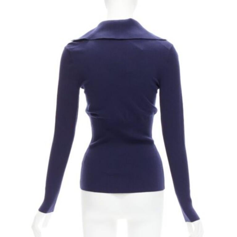 Donna ALAIA maglia a collo alto con bottoni in misto lana blu navy FR40 L. in vendita