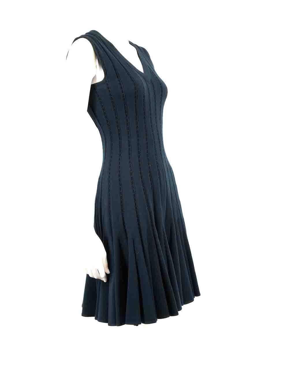 CONDITION is Very good. Hardly any visible wear to dress is evident on this used Alaïa designer resale item.
 
 
 
 Details
 
 
 Navy
 
 Wool
 
 Knitted dress
 
 Knee length
 
 Stretchy
 
 Sleeveless
 
 V neckline
 
 Flared skirt
 
 Back zip