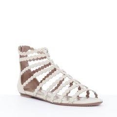 ALAIA nude suede laser cut scalloped cage gladiator open toe flat sandals EU37