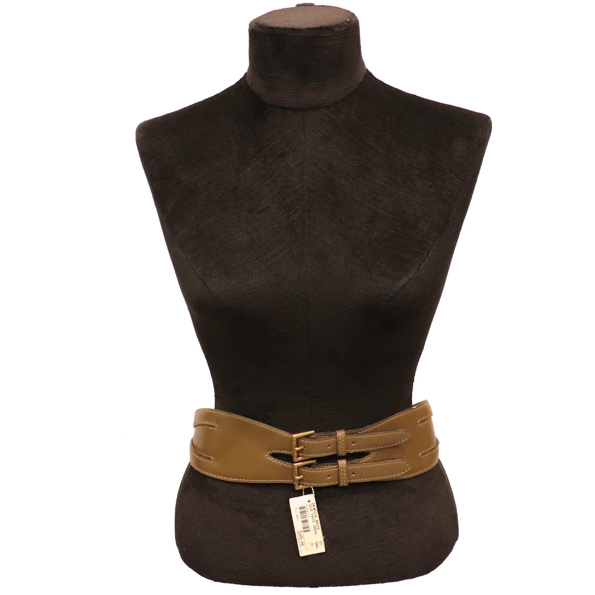 Alaia Olive Green Leather Belt W/ Gold Accents. From 1980s in excellent condition. New with Tag

Measurements:

Longest length - 30 inches
Shortest length - 28 inches
Width - 2.5 inches