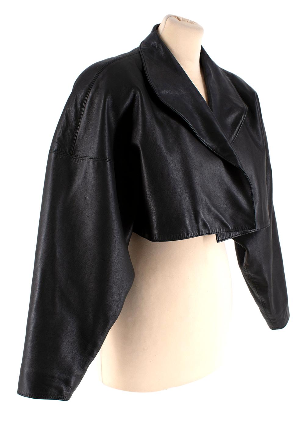 Alaia Open Front Cropped Black Vintage Leather Jacket 

- Cropped hemline
- Long exaggerated sleeves
- Fully lined
- Lightly padded shoulders

Materials:
Leather 

PLEASE NOTE, THESE ITEMS ARE PRE-OWNED AND MAY SHOW SIGNS OF BEING STORED EVEN WHEN