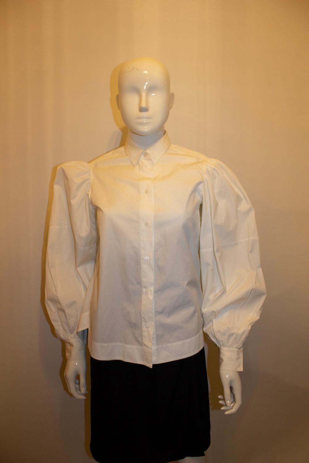 Femenino o masculino Alaia Paris Camisa blanca de algodón en venta