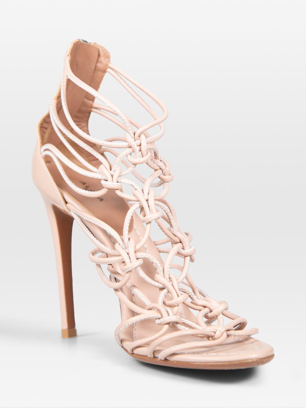 CONDITION is Very good. Minimal wear to the sandals is evident. Abrasion on the front of the insole and heel on both shoes. Discolouration on the back of the left shoe on this used Alaïa designer resale item.
 
 
 
 Details
 
 
 Pink
 
 Leather
 

