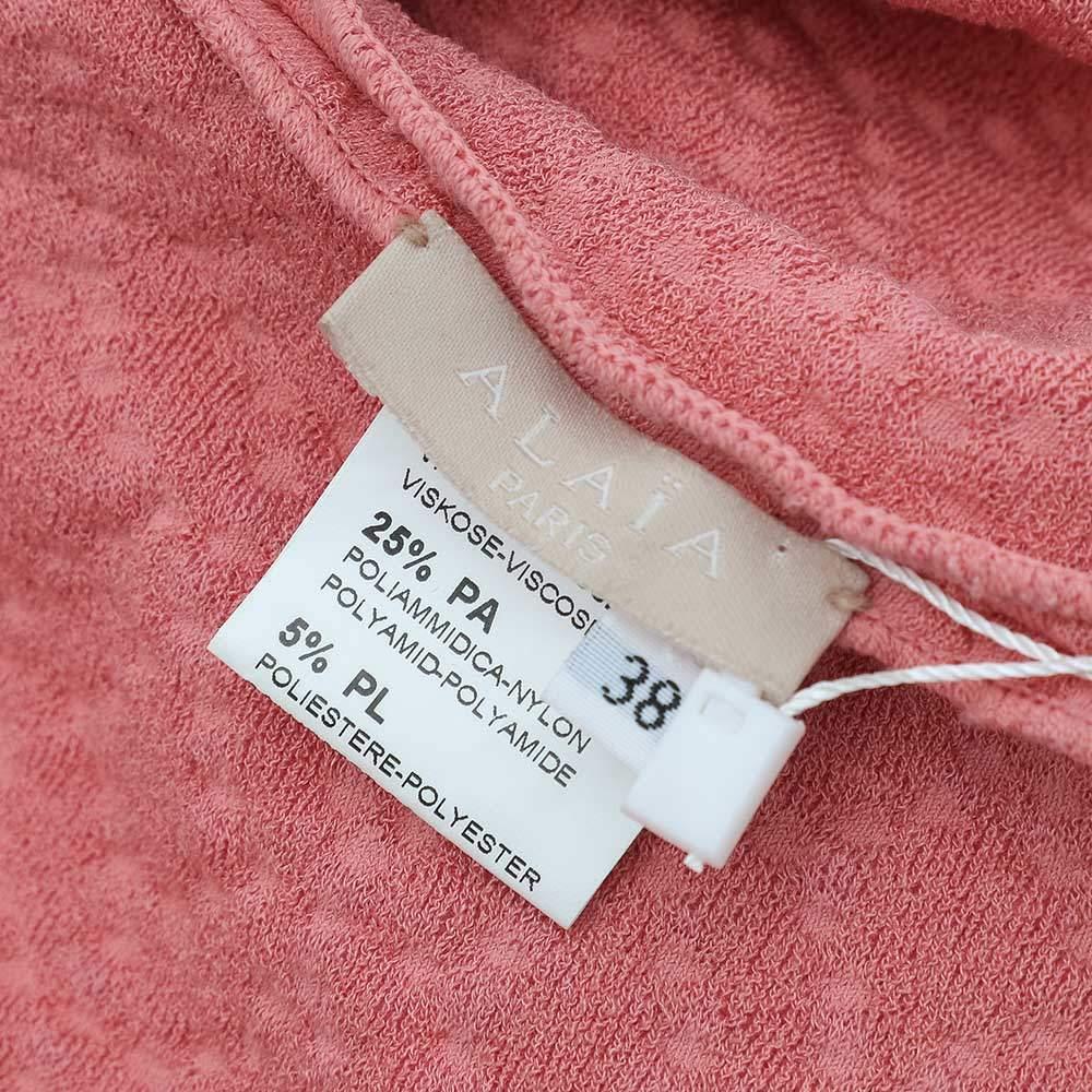 Alaia - Cache-nez en tricot rose à motifs M en vente 2