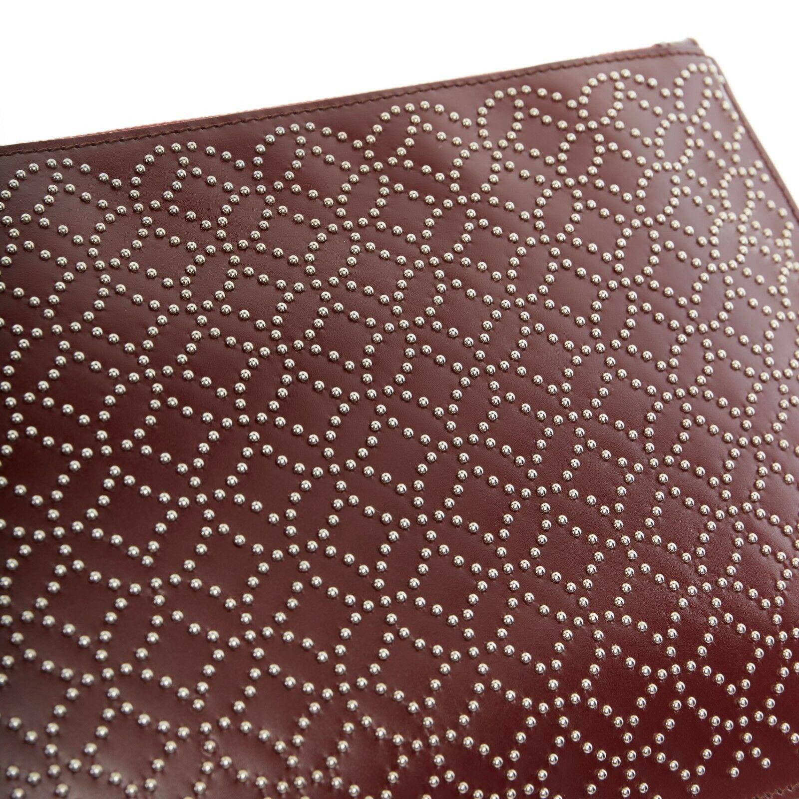  ALAIA Pochette à fermeture éclair GM en cuir rouge argenté micro clous Pour femmes 