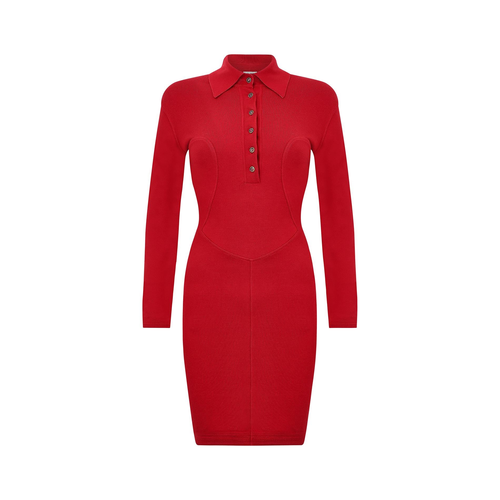 This red knitted mini dress is from the renowned 1991 collection and completely emblematic of Azzadine Alaia's sleek and heavily seamed bodycon styles. It features long sleeves and a pointed collar with five buttons, which of course can be