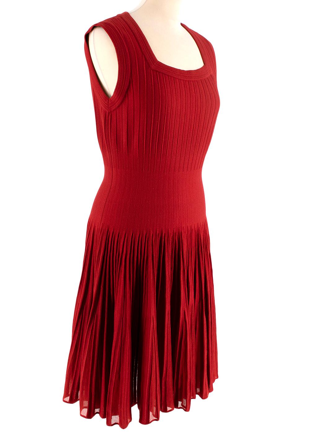 Alaia Red Stretch Knit Pleated Sleeveless Dress

- Fit & Flare Dress
- A squared neck 
- Sleeveless 
- Concealed zipper fastening

Materials: 
62% Wool 
19% Cotton 
19% Polyester and Polyamide 
Made in Italy 
Dry clean only 

PLEASE NOTE, THESE