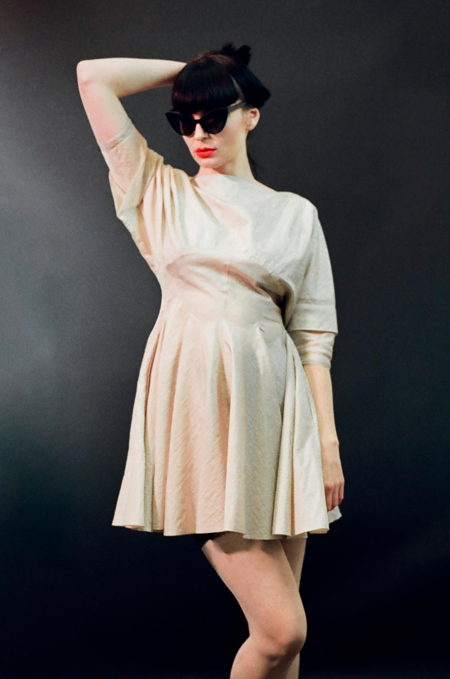 Stunning vintage Azzedine Alaïa dress from his Spring Summer 1988 collection.

Super chic dress by the master Alaïa. The cut of this piece is incredible; it has the most gorgeous feminine silhouette. It is made from a light nylon fabric and features