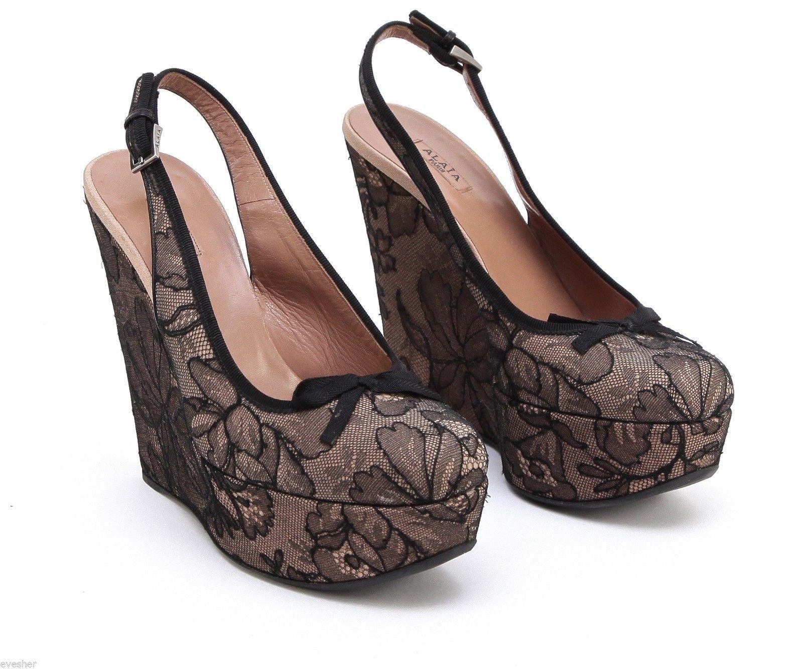 GUARANTEED AUTHENTIC GORGEOUS ALAIA PARIS LACE OVERLAY PLATFORM WEDGES

Details:
- Nude leather with black lace overlay.
- Self-covered platform.
- Rounded toe with bow on top of foot.
- Adjustable ankle strap, silver-tone signature metal buckle.
-