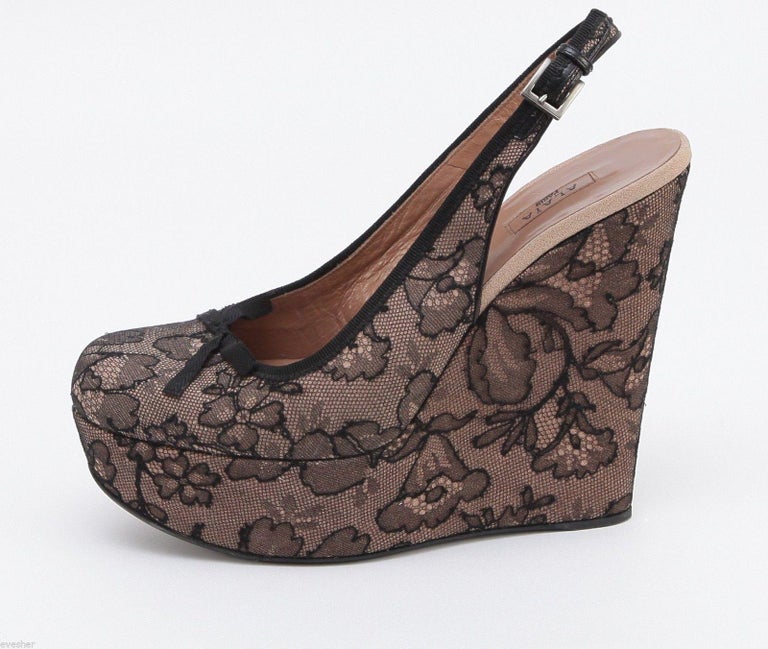 ALAIA WEDGE SANDAL IN BEIGE TAN GLOSSY CALFSKIN AND BEIGE RUBBER