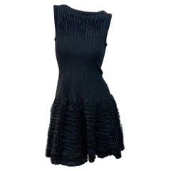 Alaïa Sculptural Black Ribbed Knit Dress with Textured Ruffle Skirt FR 38