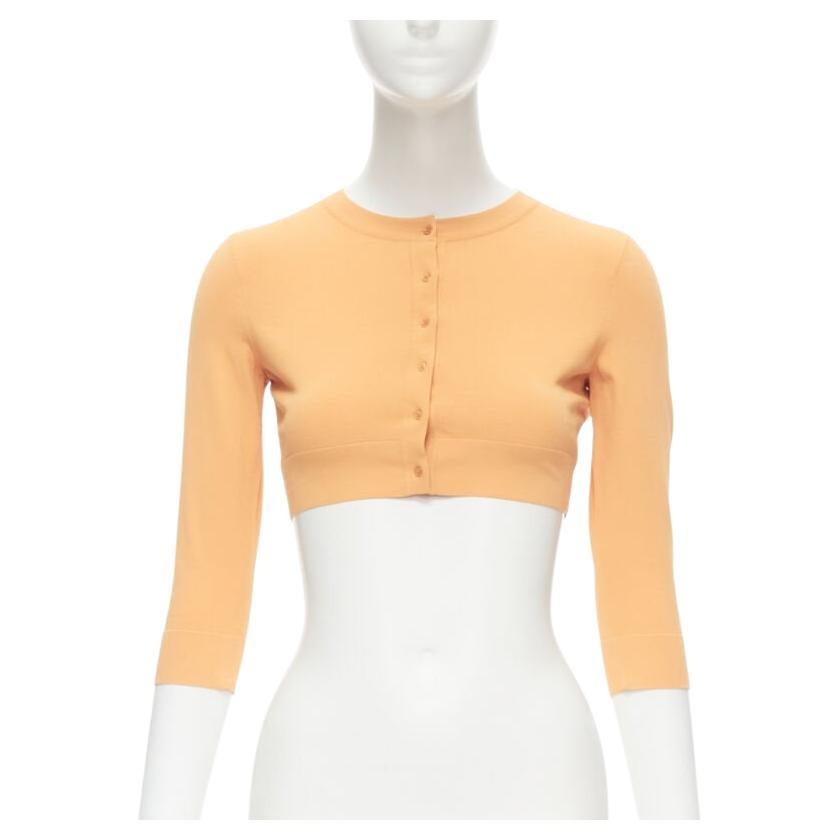 ALAIA Signature abgeschnittene Stretch-Strickjacke mit Knopfleiste Peche orange FR38 S