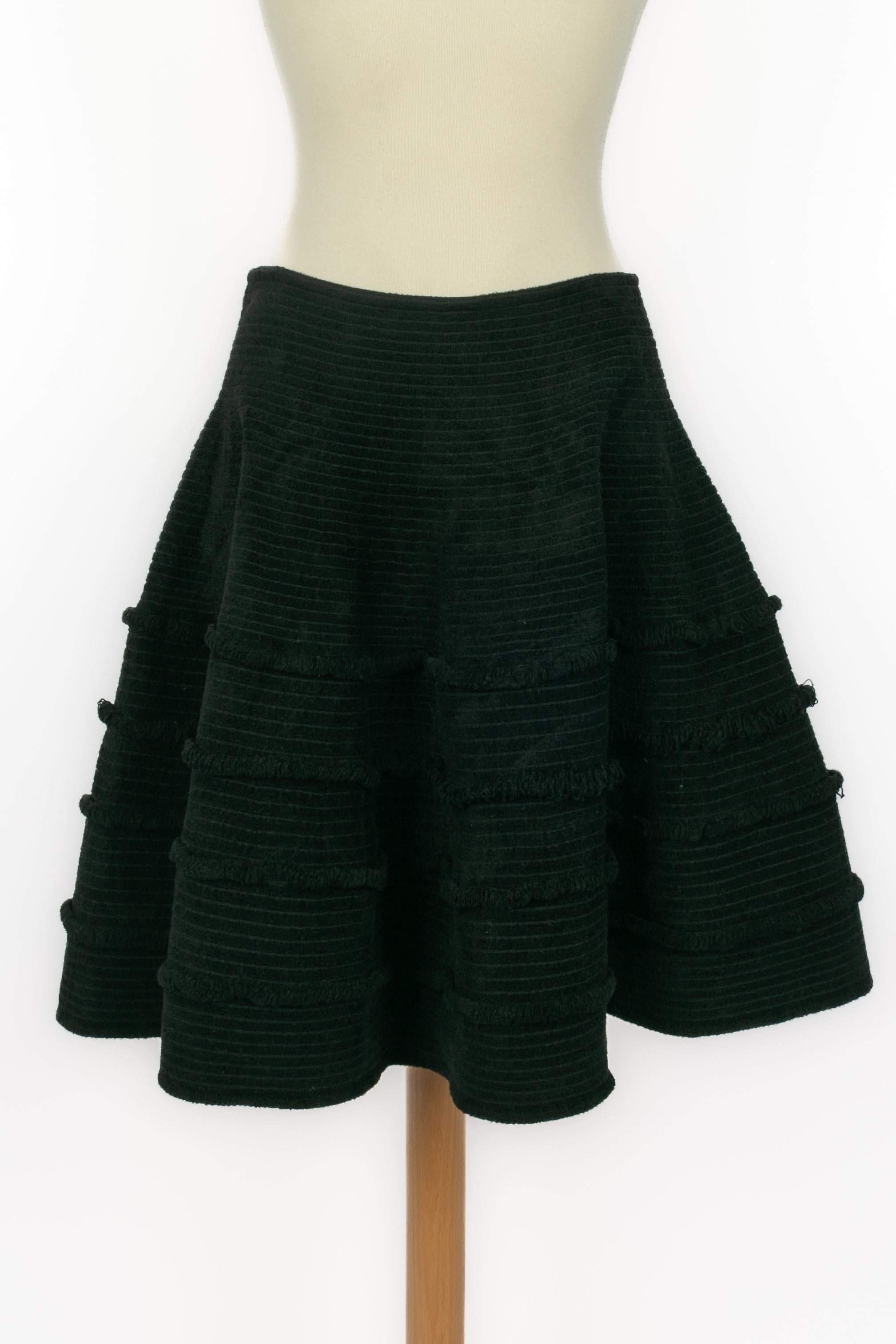 ALAÏA - (Made in Italy) Black skater skirt with a velvet effect. Size 40FR indicated. 2010 Fall-Winter Collection.

Condition:
Very good condition

Dimensions:
Waist: 34 cm - Height: 52 cm

SKU:FJ168