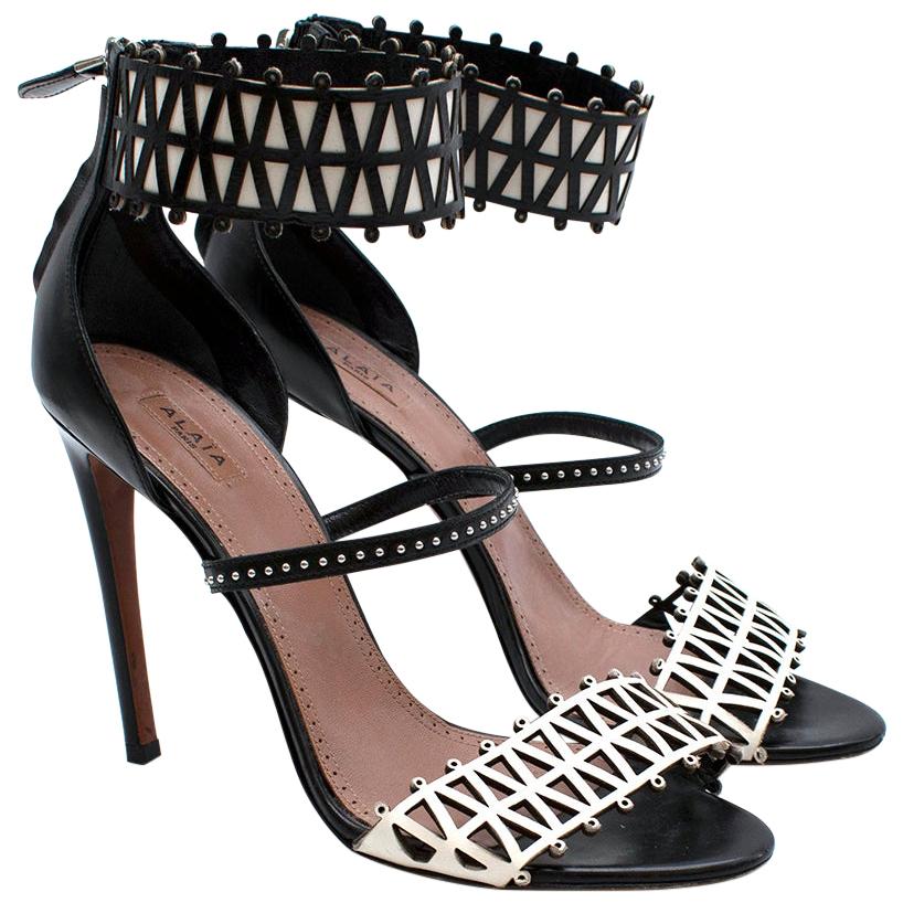 Alaia Stiletto Black & White Laser Cut Sandals - EU 40 For Sale