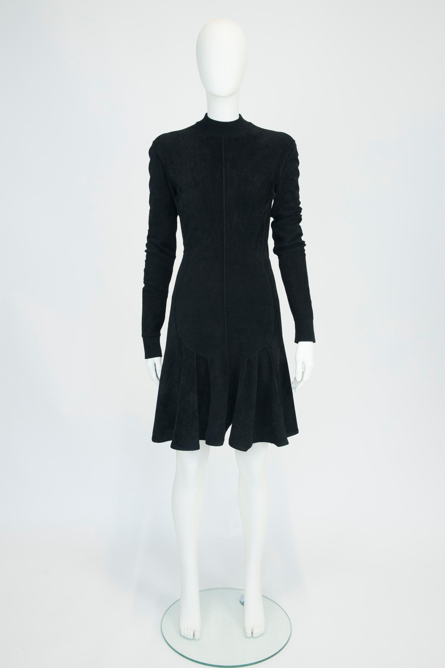 Behind Azzedine Alaïa's refined couturier skills was a simple desire to make women feel their best, confident. Made from stretchy plush black velvet, the dress has a fitted bust and waist and gently flares out to a skater-style mini skirt - an