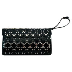 Alaia Nietenbesetzte Leder Clutch Tasche