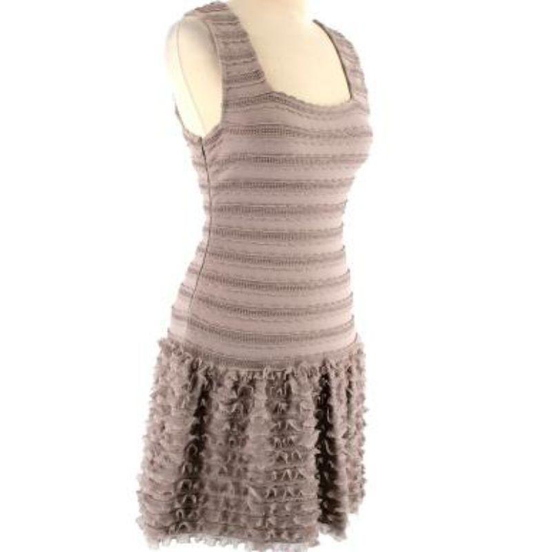 Alaia Taupe Sleeveless Ruffled Tiered Mini Dress

-Square neckline 
-Mid weight construction with slight stretch 
-Ruffler layering skirt 
-Body fitted, slight flare to the hem 
-Fully lined 
-Concealed zip fastening to the side 

Material: 

60%