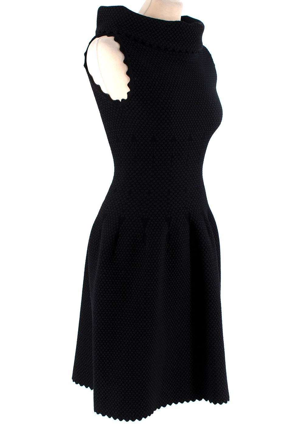 Alaia Textured Wool Black Fitted Scalloped Mini Dress

-Textured 
-Skater style
-High roll neck
-Scalloped-edge trim on neck and hem 
-Sleeveless

Material:
50% Wool 
25% Viscose
20% Polyamide
5% Polyester

Made In Italy 

Dry clean only 

PLEASE