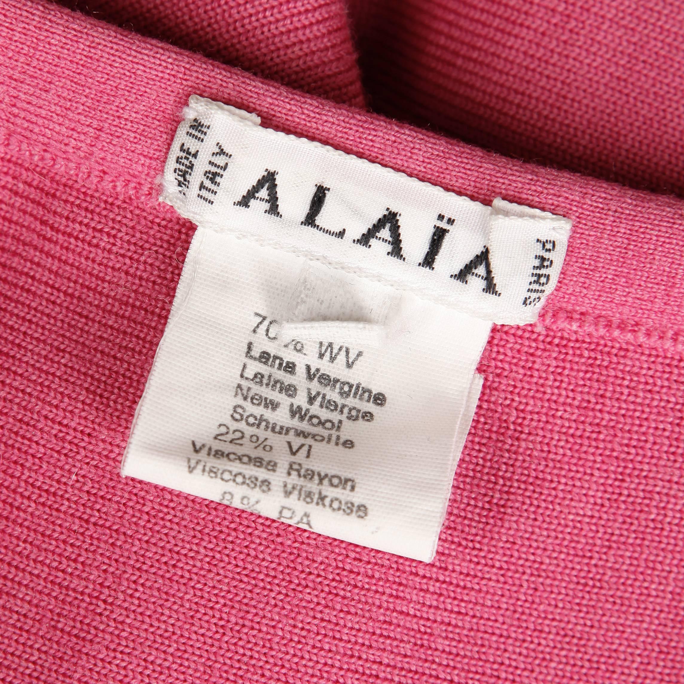 Unglaublich Vintage Alaia Rock in zwei Ton rosa! Plissee-Detail mit Handnaht auf der Rückseite des Strickstücks. Hakenverschluss vorne. Unbeschriftet. Der Stoff besteht aus 70% Wolle, 22% Viskose und 8% Nylon. Die angegebene Größe fällt klein aus