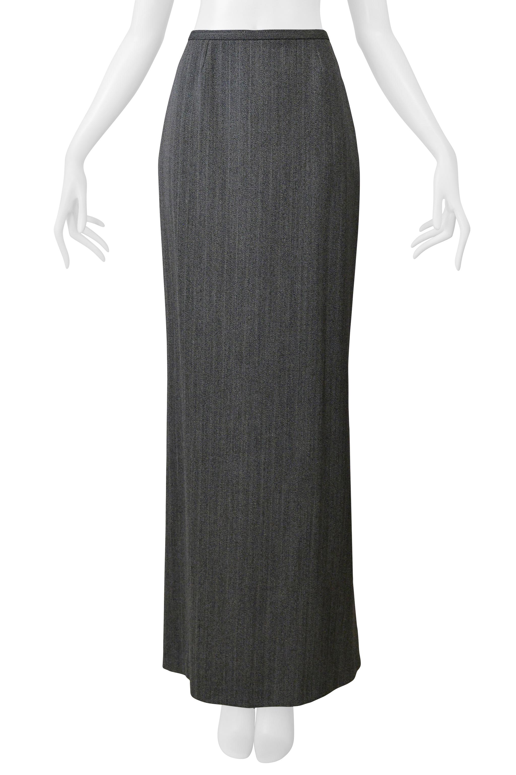 Resurrection Vintage is excited to offer a vintage Azzedine Alaia grey wool pinstripe skirt featuring a straight silhouette with a flared hem, high-waisted, back zipper, and ankle-length.  


Azzedine Alaia 
Size: No Size Label
Fabric: No fabric