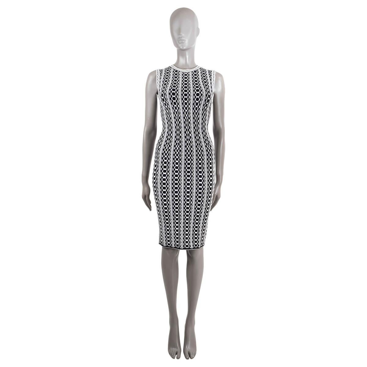 100% authentic Alaïa python-jacquard knit dress in black and white viscose (70%), polyamide (15%) and polyester (6%). Opens with a concealed zipper on the side. Unlined. Brand new comes with tags.

Measurements
Model	2E9MR006R014
Tag