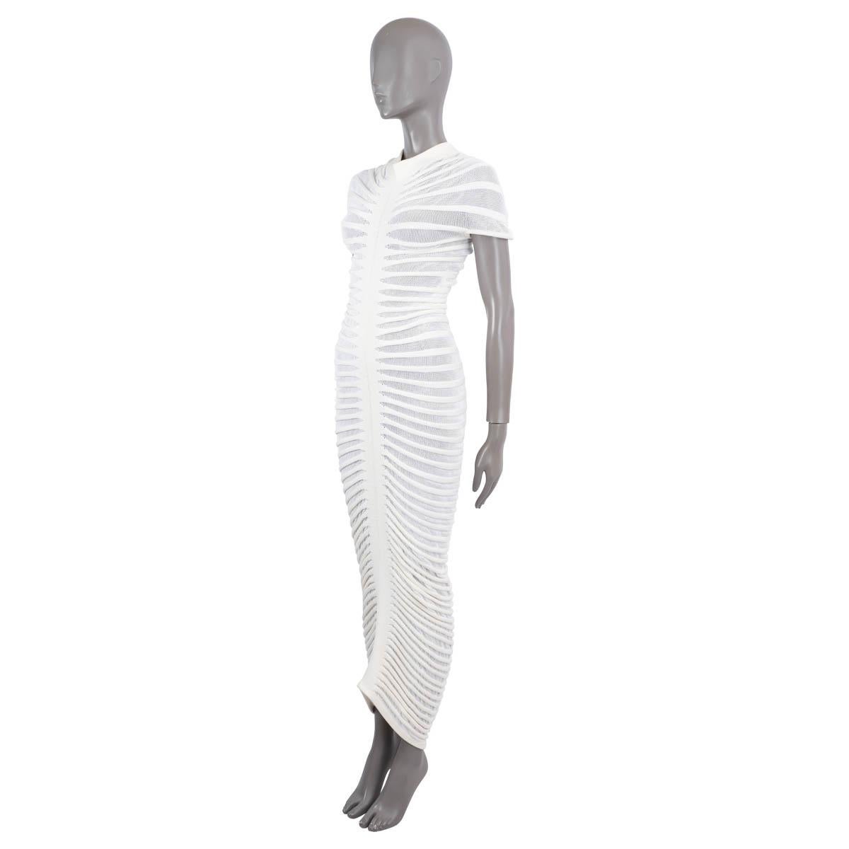 100% authentic Alaïa open-knit maxi dress in off-white cotton (65%), polyamide (35%). Fabric 2: is made of viscose (75%) polyamide (24%) and polyurethane (1%). Opens with a zipper on the back, top and bottom. Unlined. Has been worn once and is in